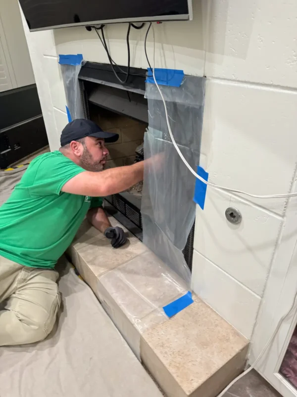 Technician inspecting chimney